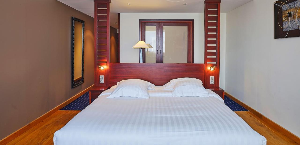 Le Mauritia Hotel Et Spa Порник Екстериор снимка