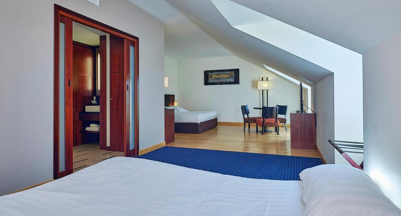 Le Mauritia Hotel Et Spa Порник Екстериор снимка