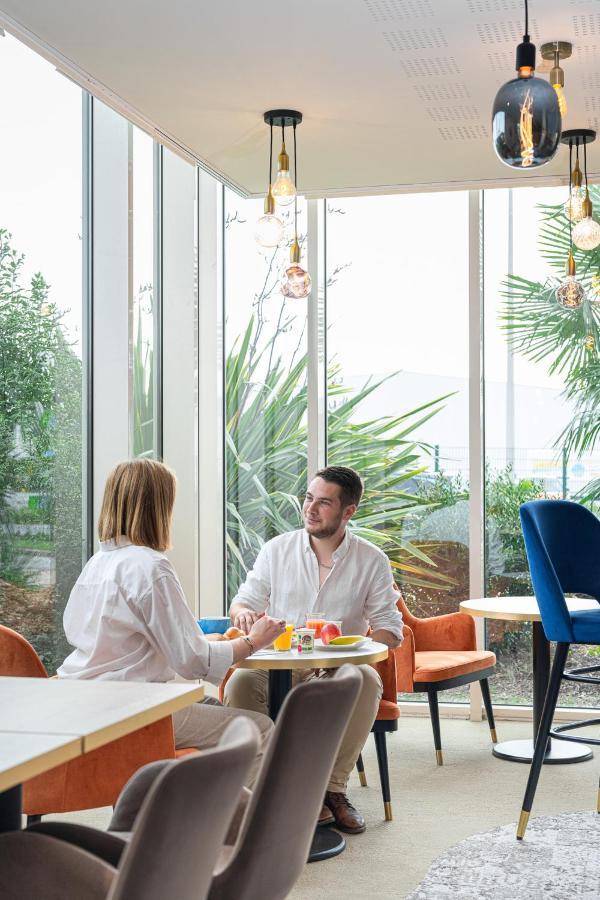 Le Mauritia Hotel Et Spa Порник Екстериор снимка